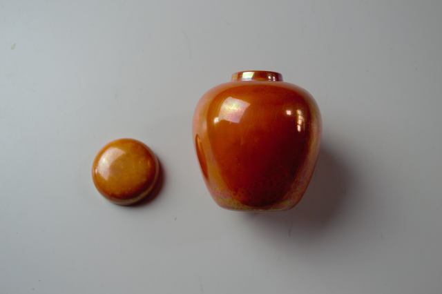 Ruskin Pottery Orange Lustre Ginger Jar.