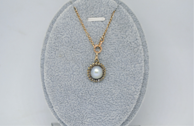 A 19th C. Pearl Mounted with Rose Cut Diamond Pendant and 9ct Gold Chain.
