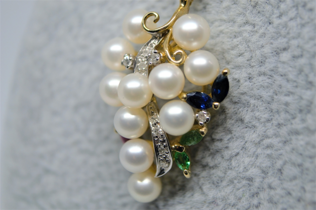A 9ct Gold Cultured Pearl, Sapphire, Ruby And Diamond Pendant And 9 ct Chain.