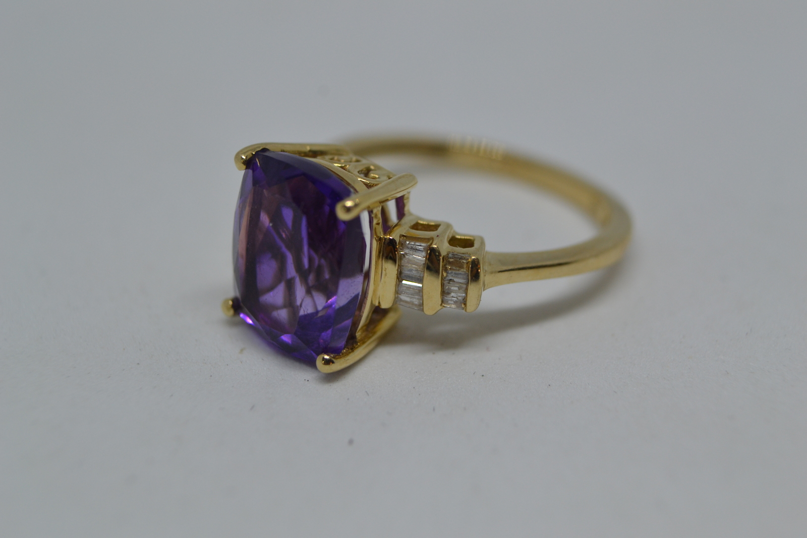A 9 ct Cushion Cut Amethyst And Diamond Ring