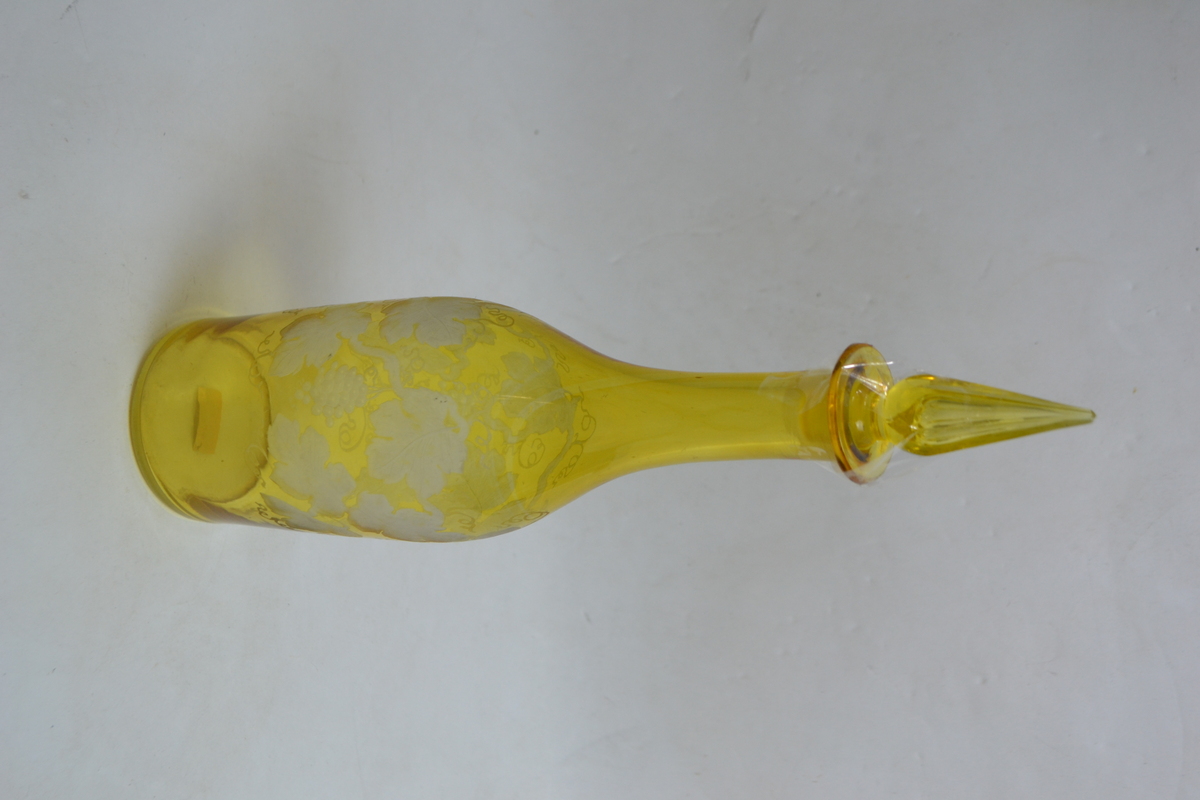 A 19th Century Continental Bottle Form Decanter Cased in Citron