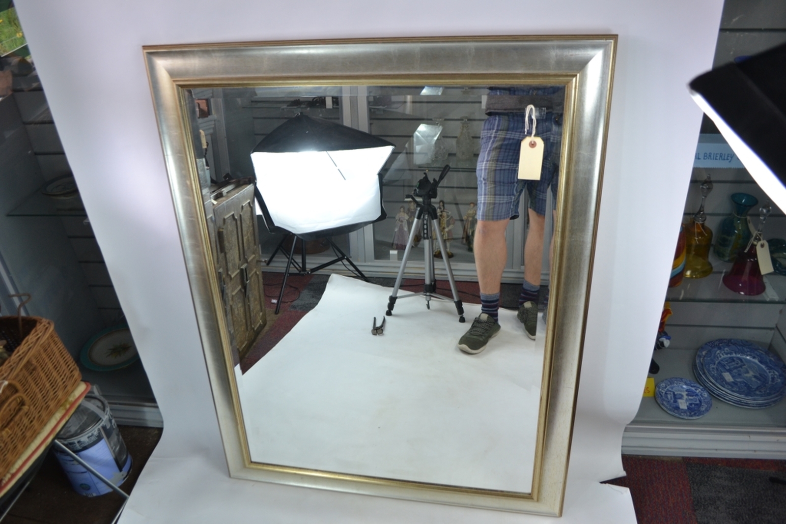 Gilt framed bevelled edge mirror.