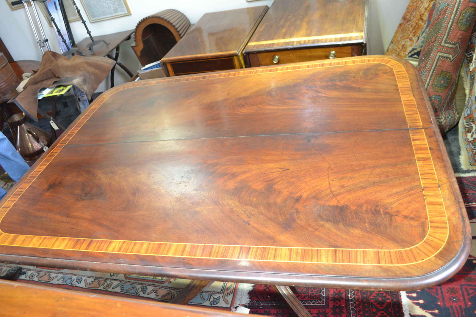 Regency Period flame Mahogany and satinwood banded breakfast table