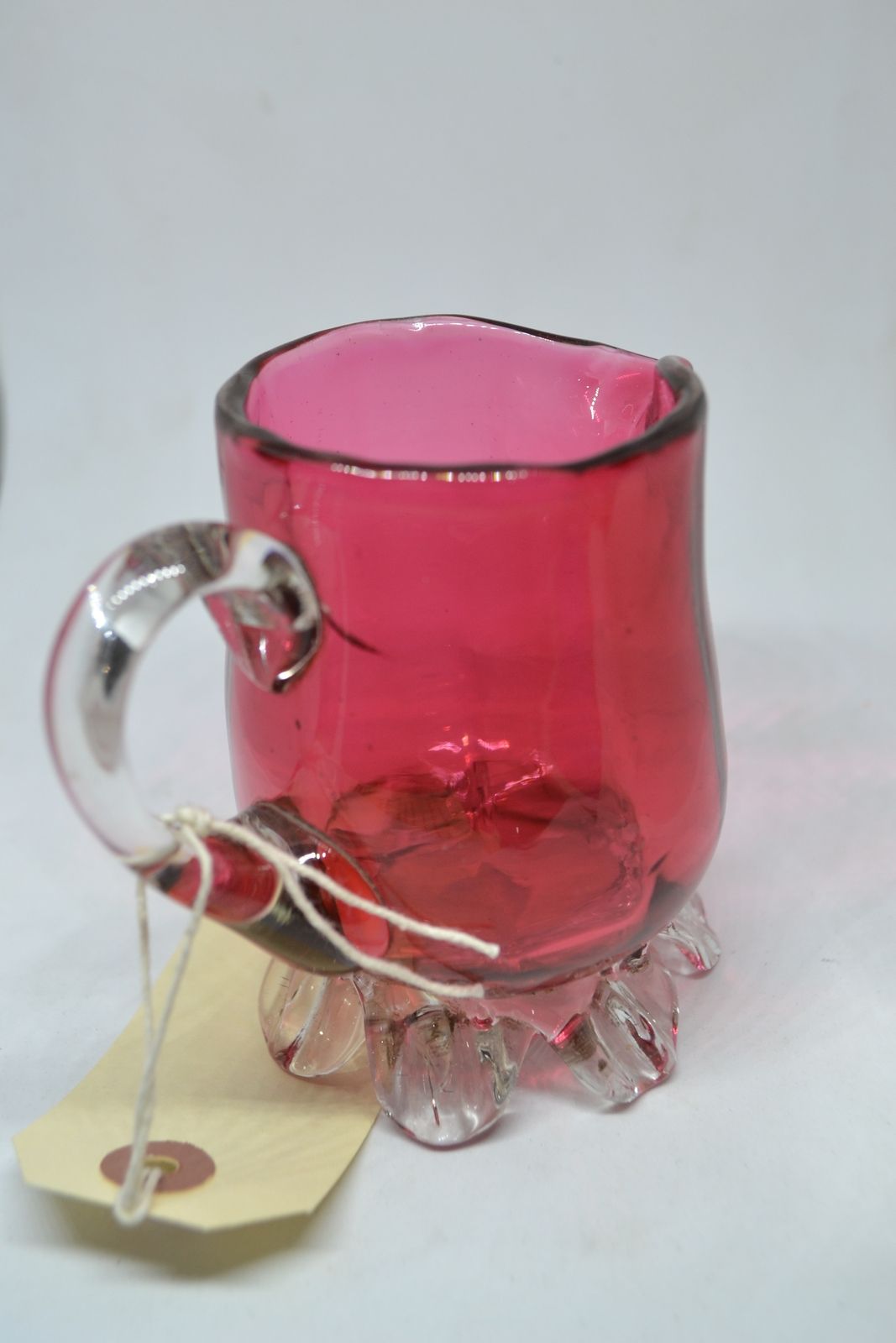 A Cranberry Milk Jug, circa 1860.