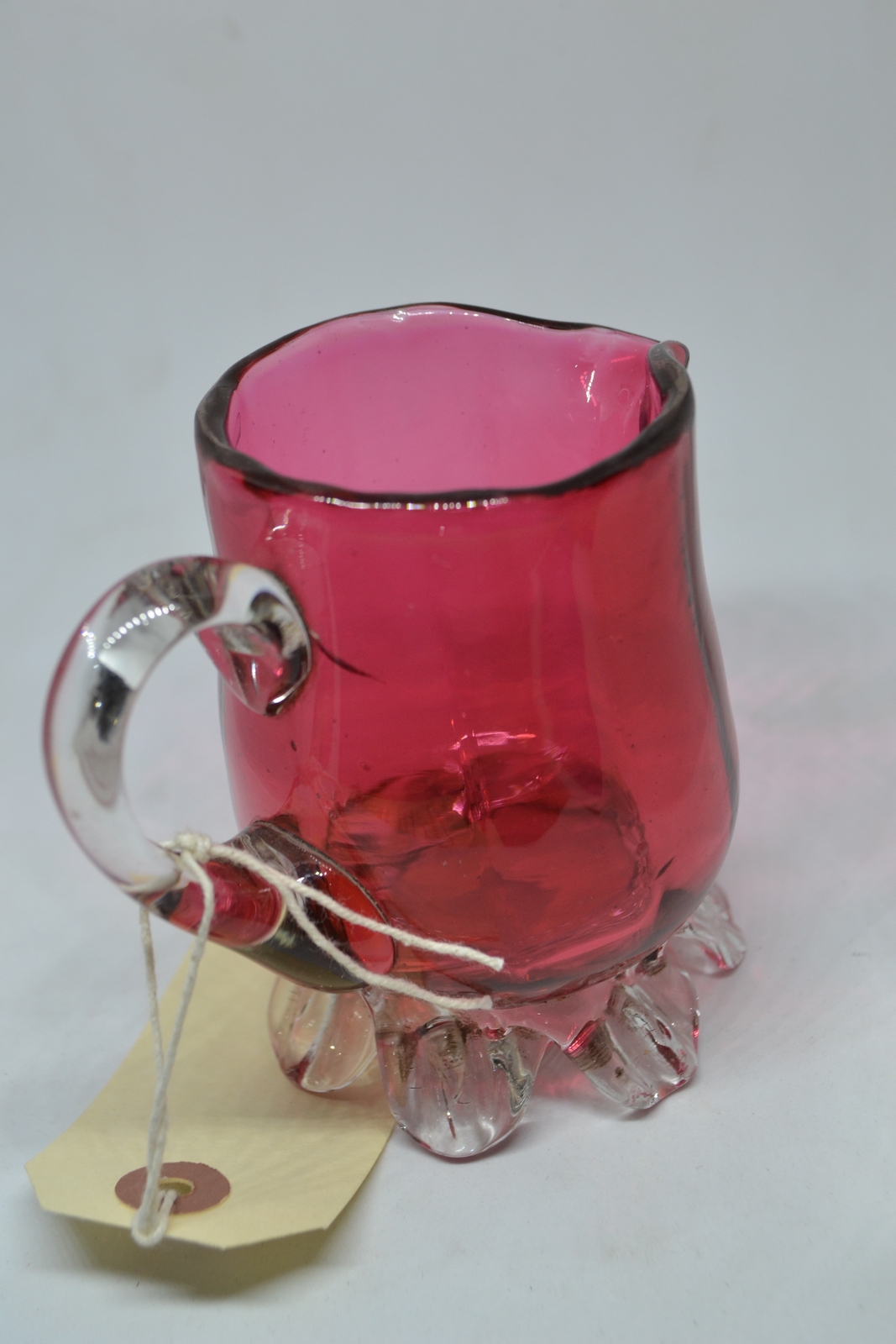 A Cranberry Milk Jug, circa 1860.