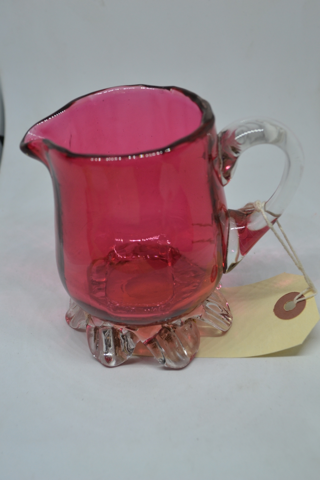 A Cranberry Milk Jug, circa 1860.