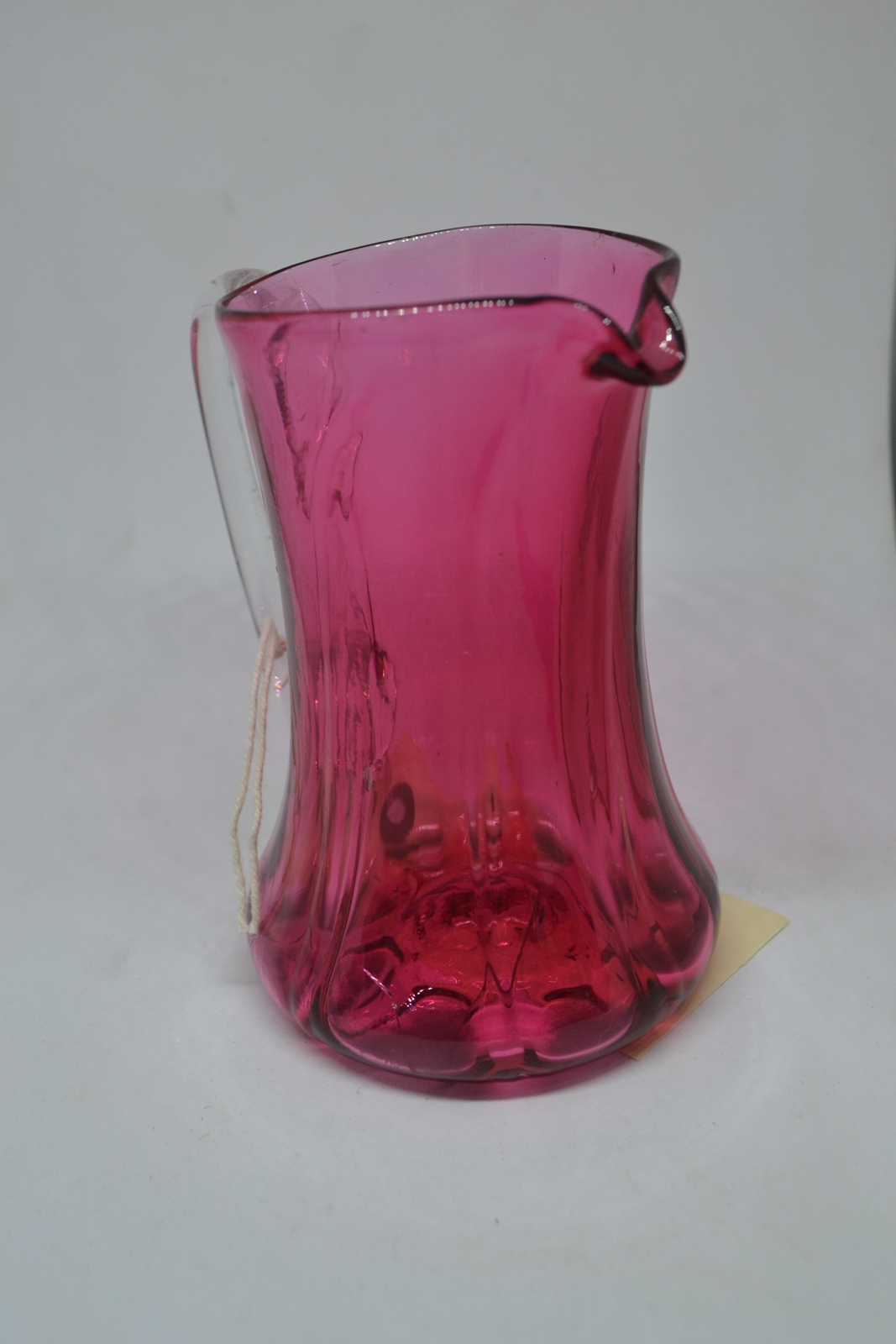 A Cranberry Milk Jug, c1860.