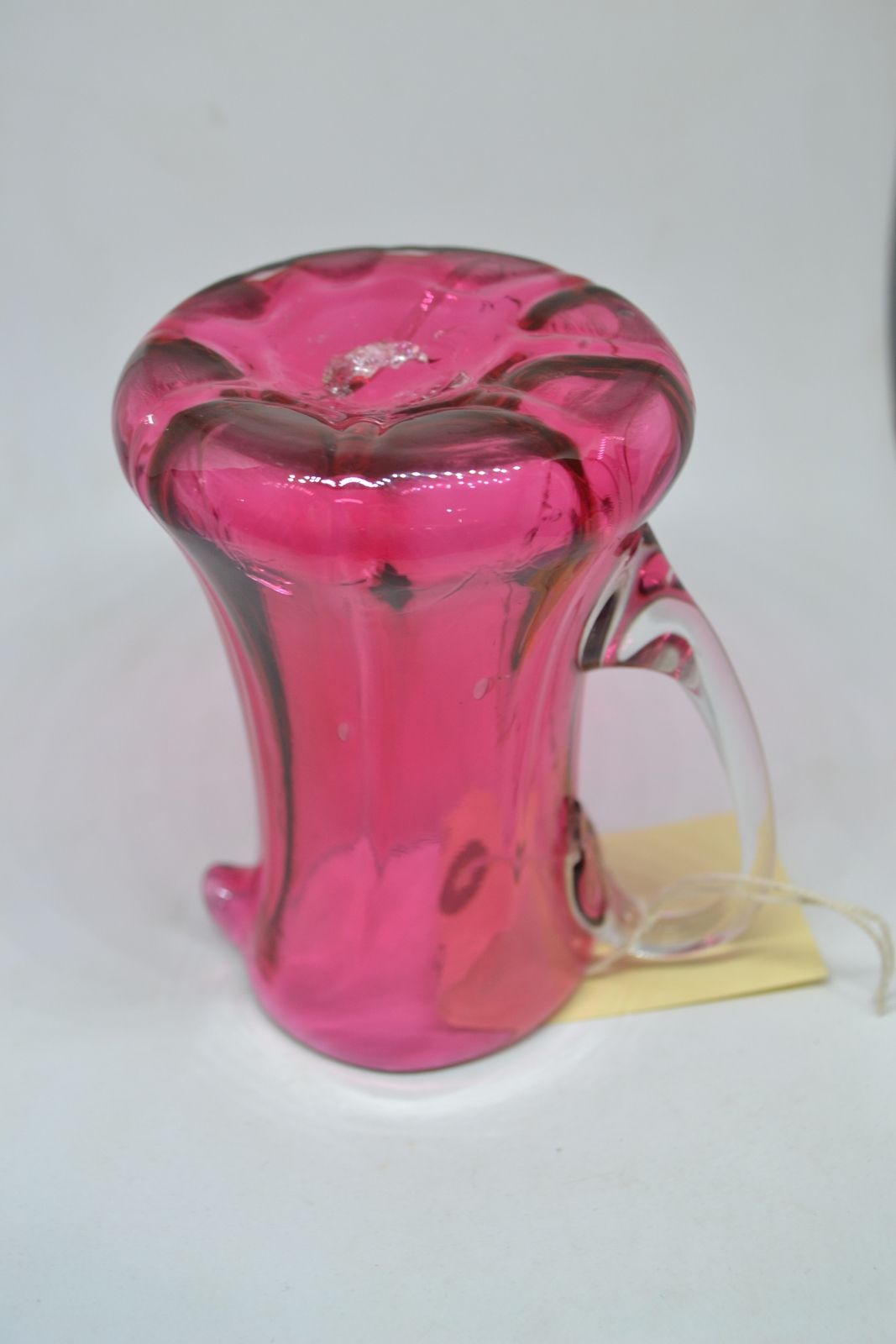 A Cranberry Milk Jug, c1860.