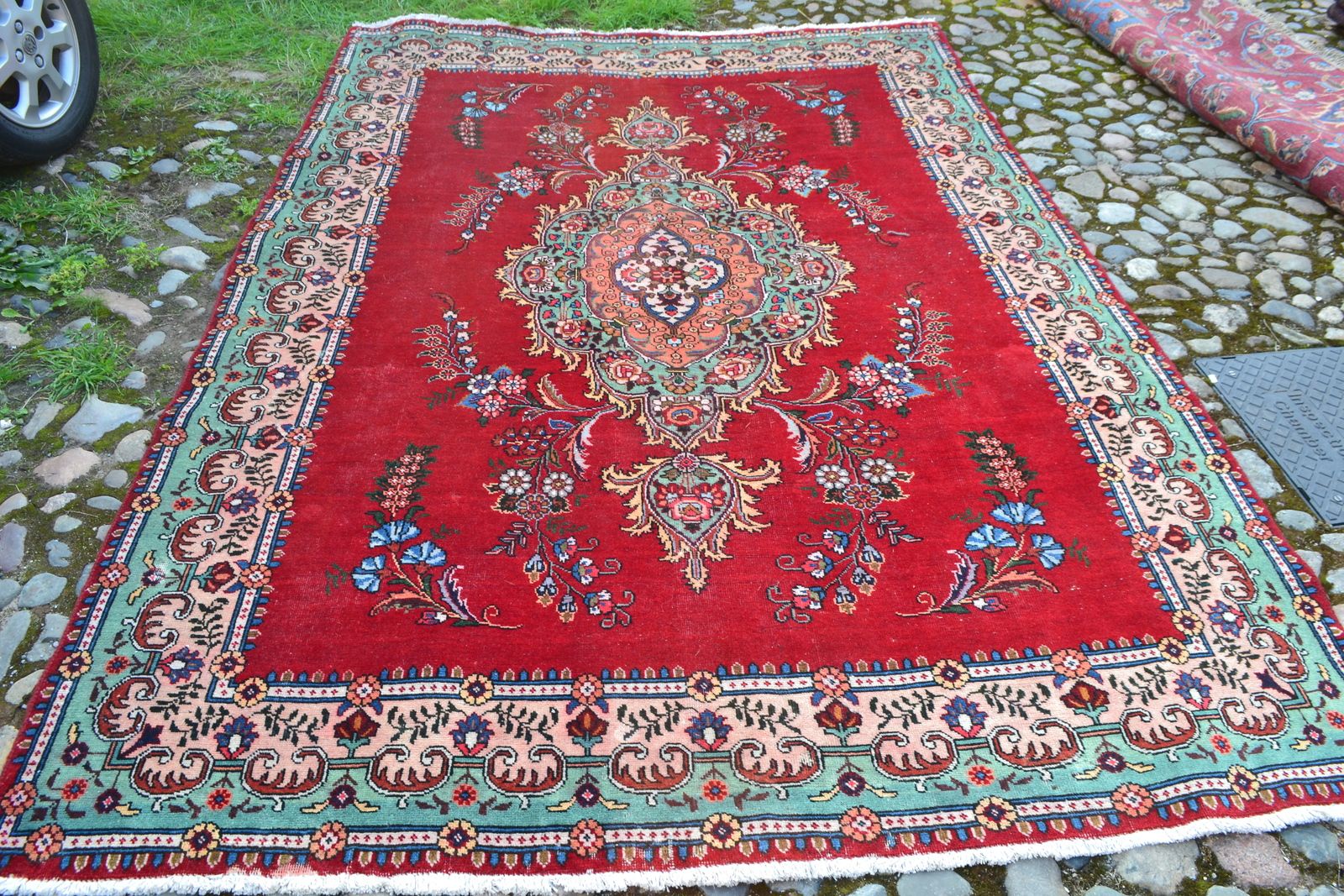 A Vintage Multi Coloured Ground Persian Tabriz Carpet
