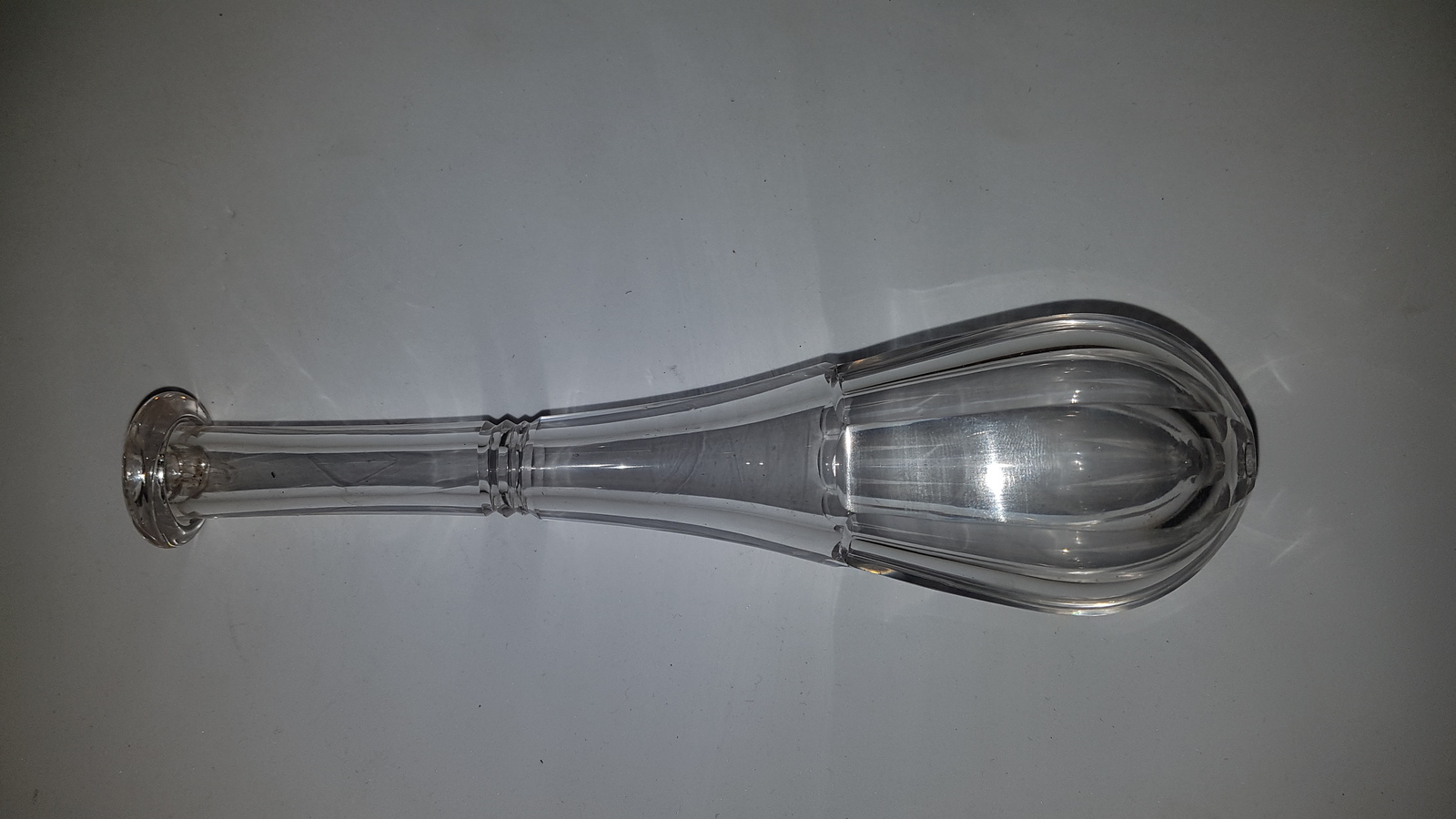 19th C. An English Glass Toddy Lifter