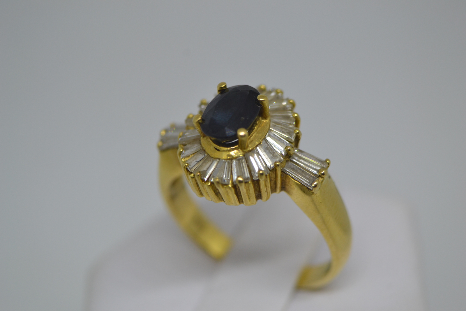 An 18ct yellow gold Sapphire and diamond ring