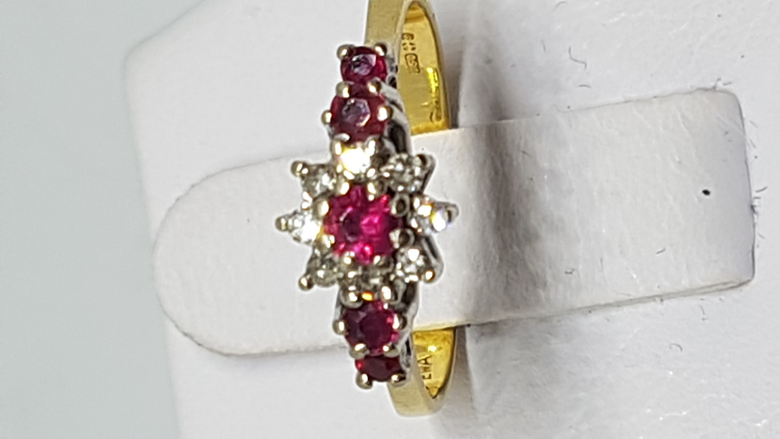 An 18 Ct Gold Ruby And Diamond Dress Ring