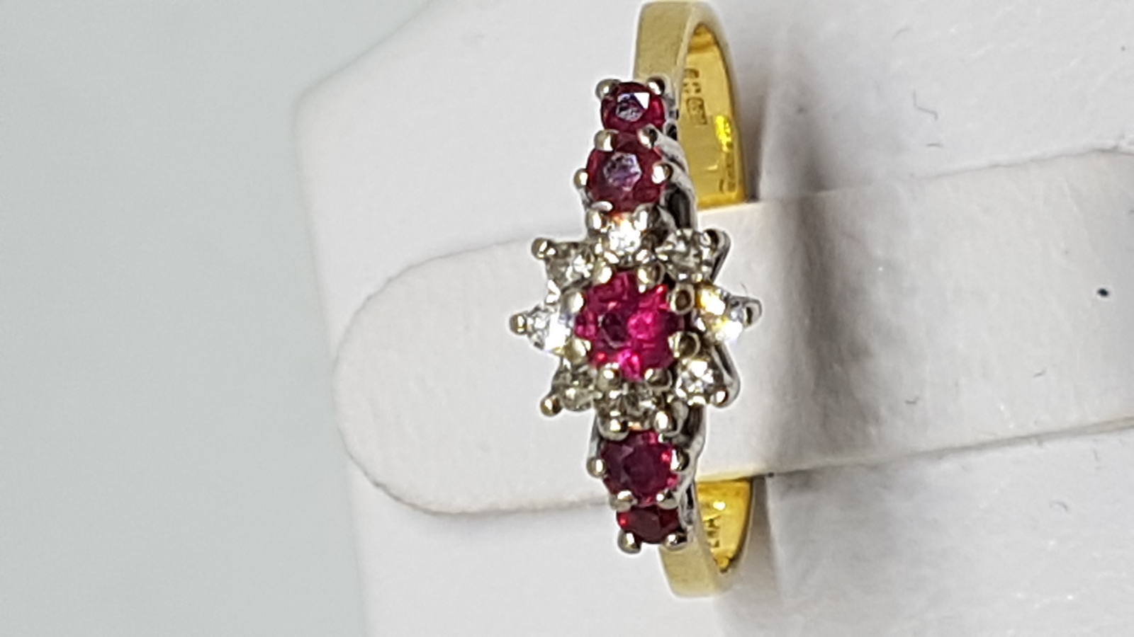 An 18 Ct Gold Ruby And Diamond Dress Ring