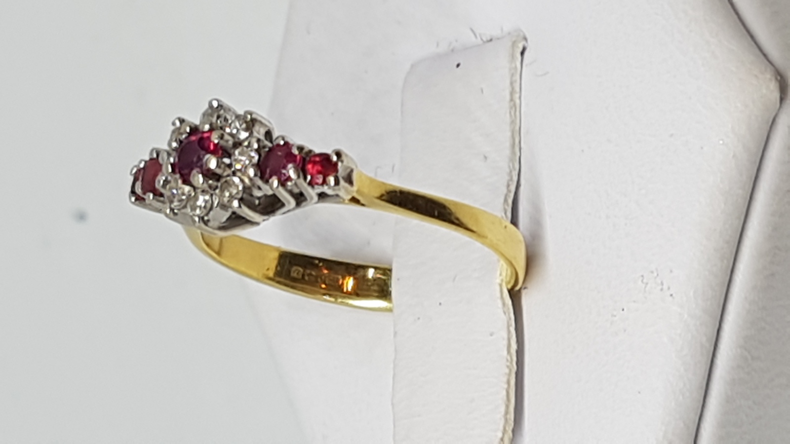 An 18 Ct Gold Ruby And Diamond Dress Ring