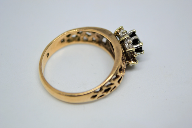 A 9ct Gold Sapphire and Diamond Ring.