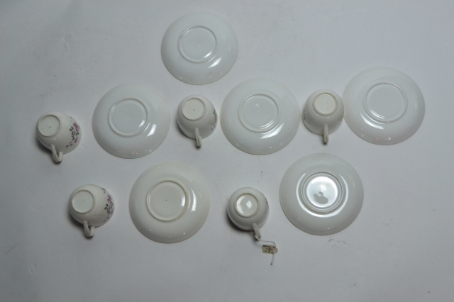 Demitasse Five Cups and Six Saucers.