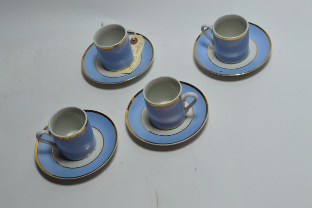 Four Demitasse Coffee Cups and Saucers.