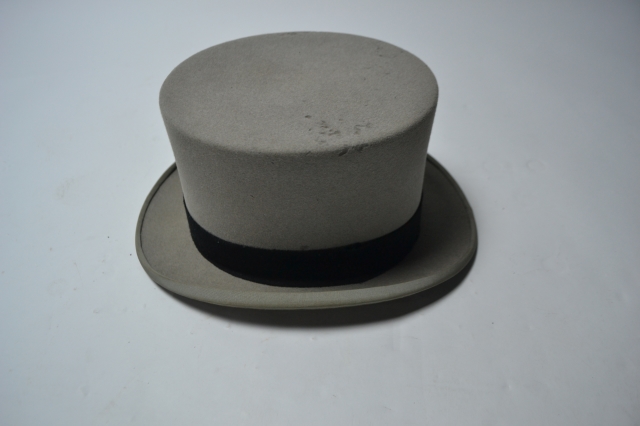 Moss Brothers top hat with a pair of gloves
