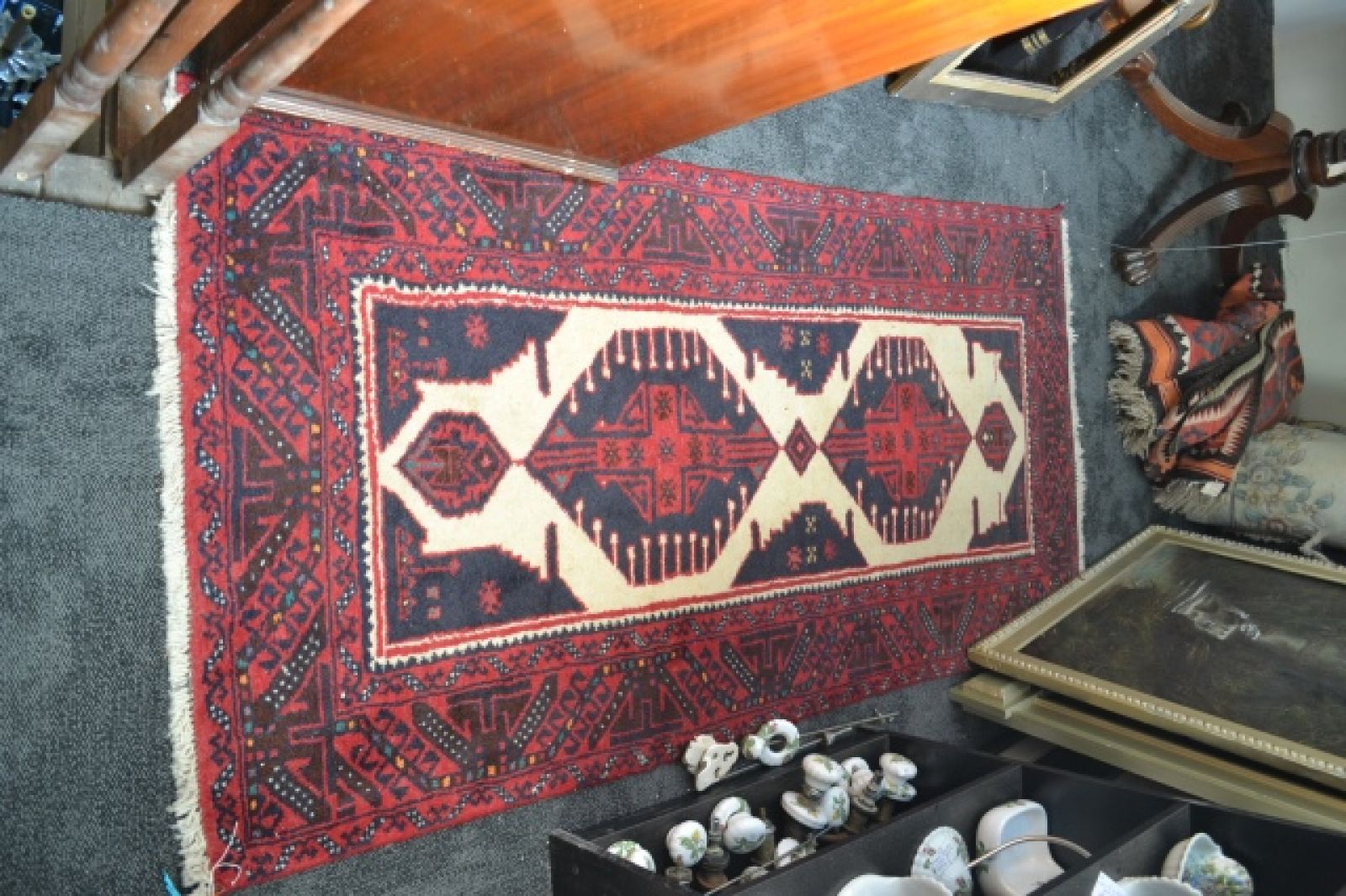 A large Afghan Carpet.